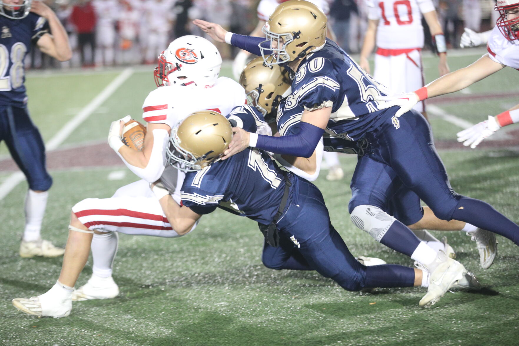 Aquinas Blugolds Defeat Columbus Cardinals in Brutal High School Football Game | Colton Brunell Sets State Rushing Record, Shane Willenbring’s Defensive Prowess Dominates