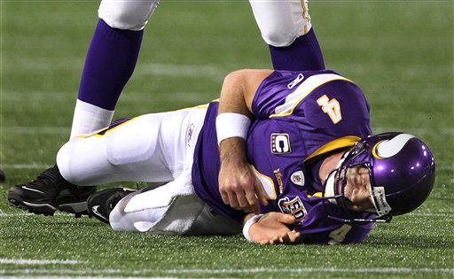 Minnesota Vikings quarterback Brett Favre watches from the sidelines during  the second half of an NFL football game against the Buffalo Bills on  Sunday, Dec. 5, 2010, in Minneapolis. Vikings won 38-14.