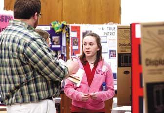 Students compete with research projects during National History Day competition