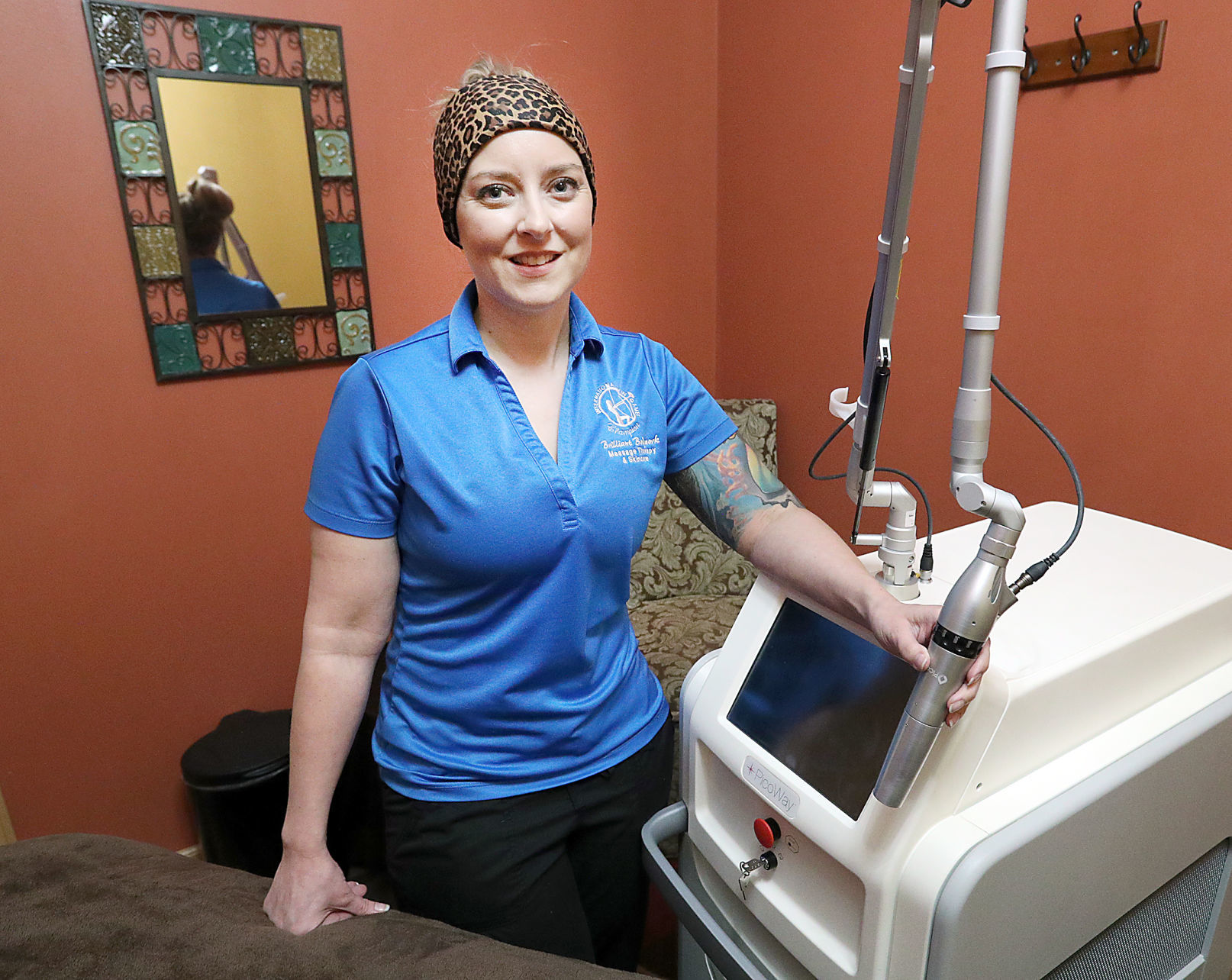 Onalaska business owner offers fresh start to abuse victims through tattoo removal pic