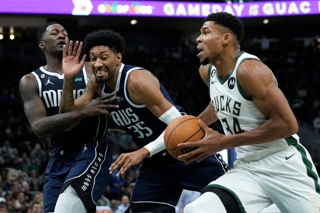 New Orleans Pelicans guard CJ McCollum (3) passes the ball during the  second half of an NBA basketball game against the Orlando Magic, Friday,  Jan. 20, 2023, in Orlando, Fla. (AP Photo/Phelan