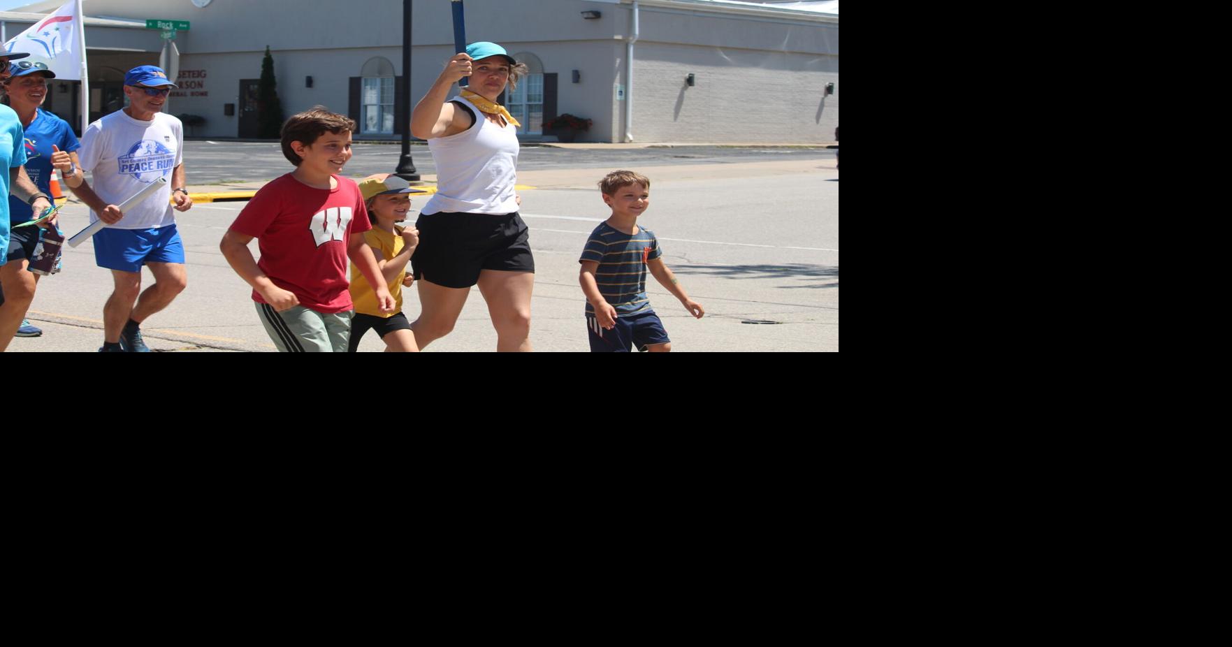 Torch run passes through Viroqua spreading message of peace