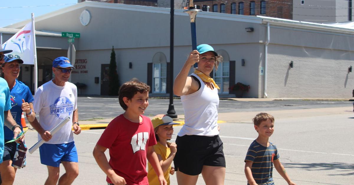Torch run passes through Viroqua spreading message of peace