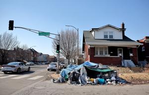 St. Louis homeowners demand removal of homeless tent outside their house, sue city