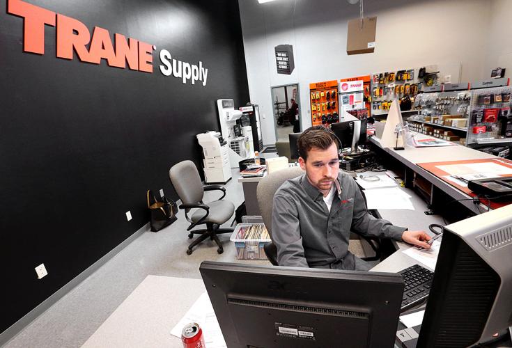 Supply store celebrates expansion with open house