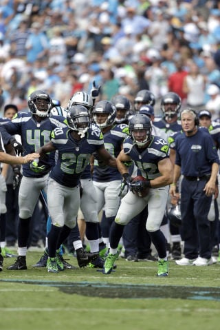 Chris Maragos of the Seattle Seahawks in action against the Denver