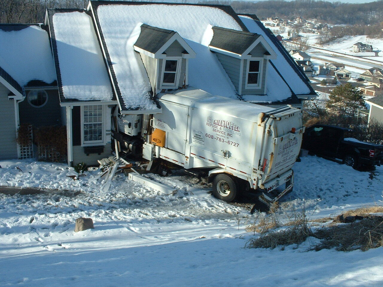 Garbage Truck Crashes Into Onalaska House