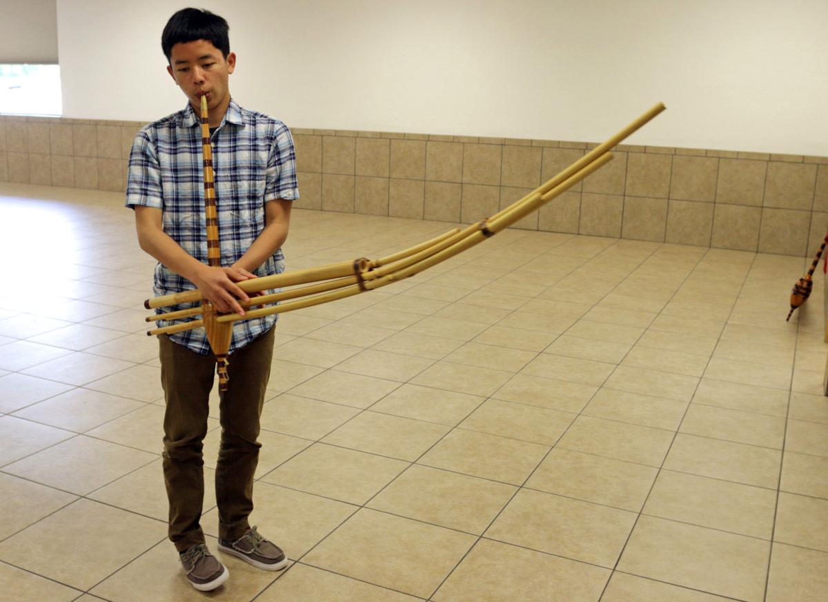Hmong youth carry on tradition of playing qeej | Local News | lacrossetribune.com