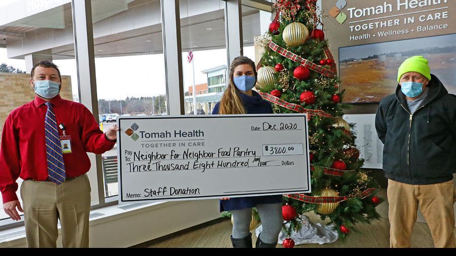 Tomah Wellbeing workforce donate to food items pantry | Information