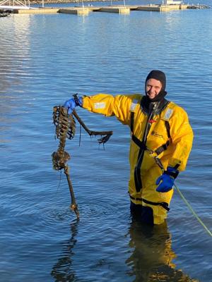 Fisherman hooks what he believes are human remains in northwest Indiana lake