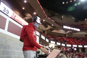 Meet the Wisconsin alum behind the music — and the mood — at Badgers basketball and football games