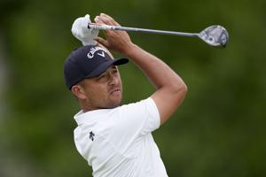 Schauffele, Morikawa share PGA lead with plenty of company