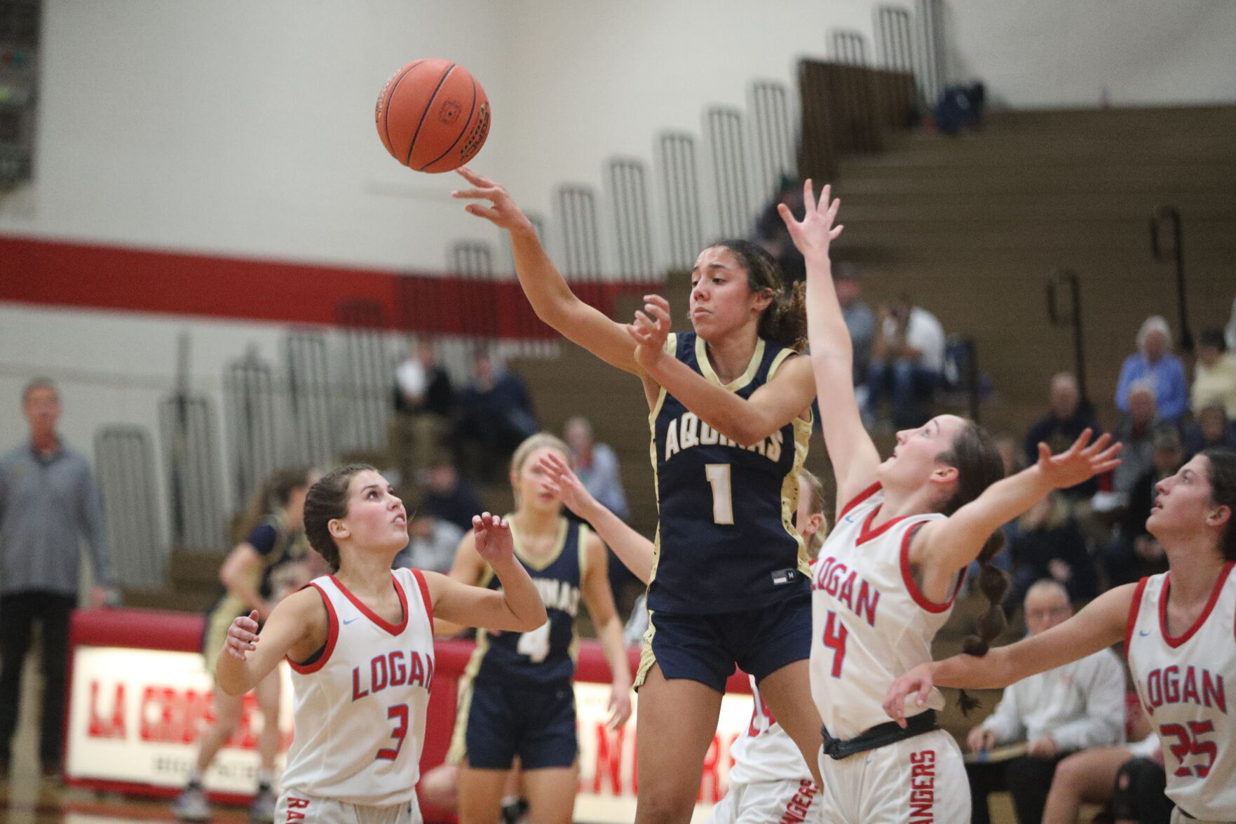 La Crosse Aquinas Girls Basketball Team Secures 91st Consecutive Conference Win with 61-45 Victory