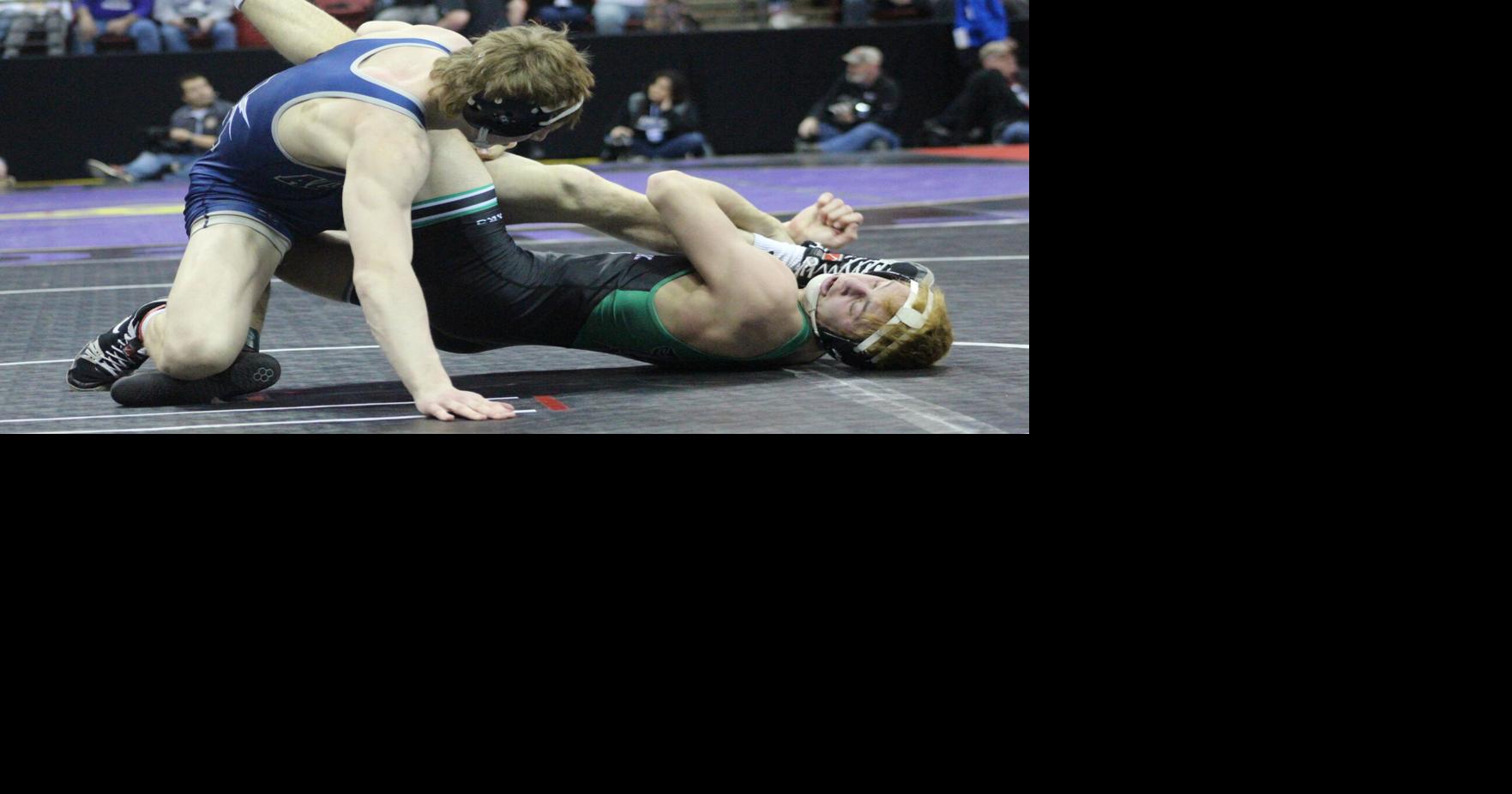 WIAA state wrestling La Crosse Aquinas senior Tate Flege celebrates