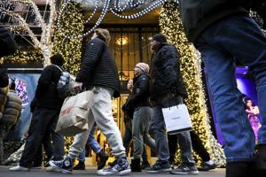 Holiday sales likely to top $957 billion as deal-hungry shoppers slow spending, retail group says