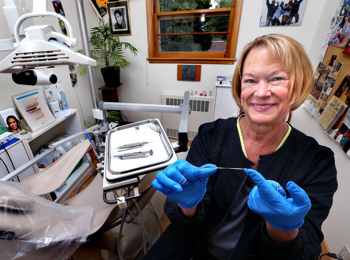 La Crosse dentists tout tooth of the matter on flossing