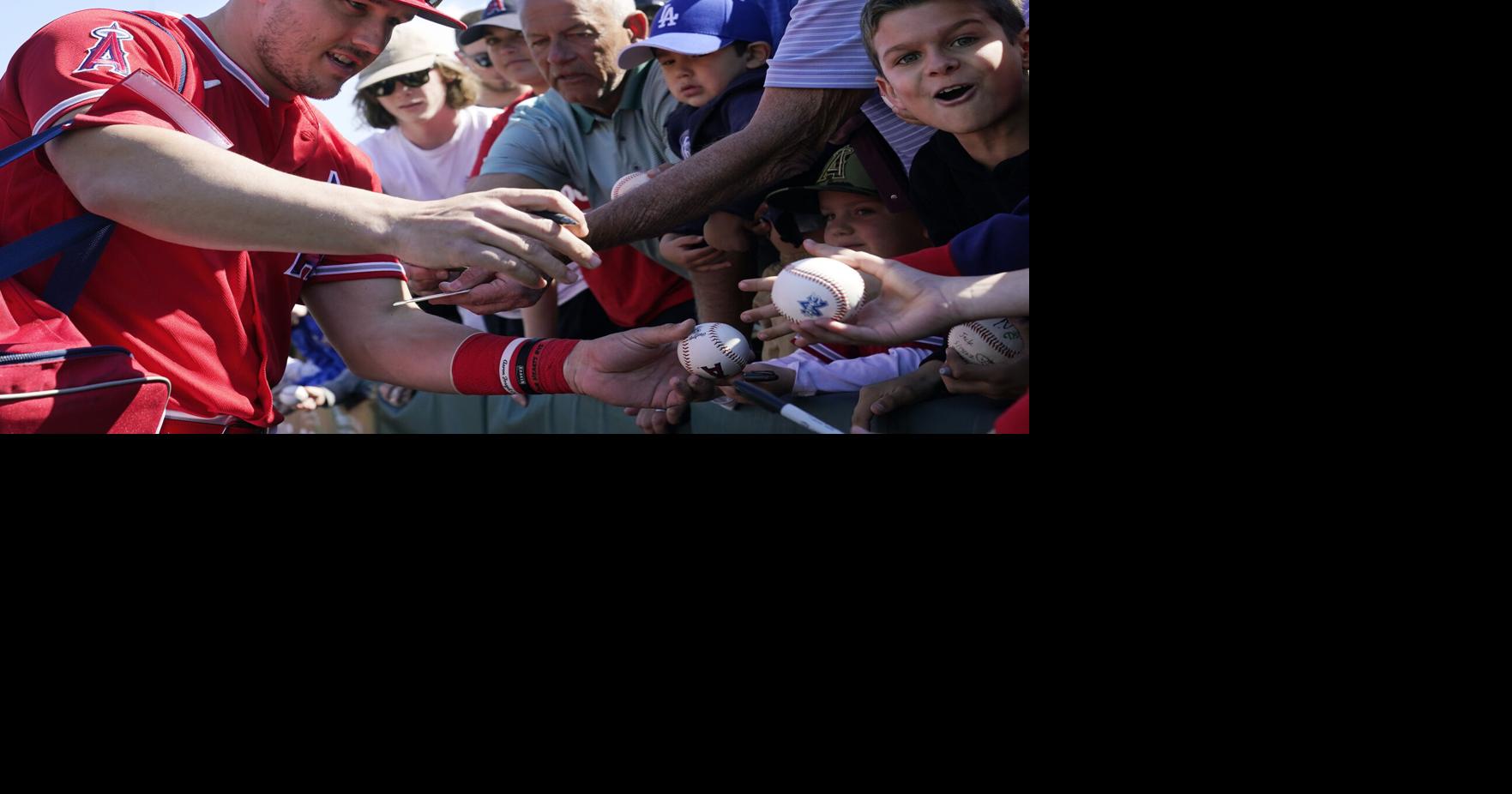 St. Petersburg, FL. USA; Happy Red Sox fans taking a selfie at the