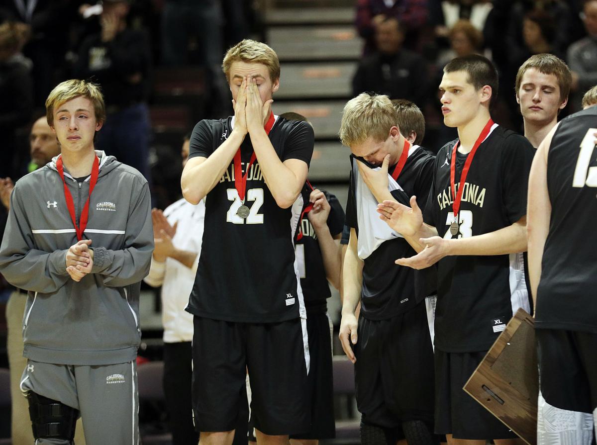 Boys high school basketball Redhot Tigers down Caledonia