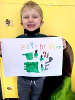 Kindergarteners encourage changes to better the community, world