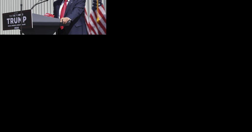 Trump stops by a gun shop resuming inperson campaigning after a weekend leveling treason claims