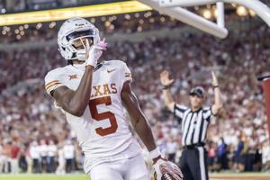 No. 4 Texas tries to stay grounded even as hype level soars