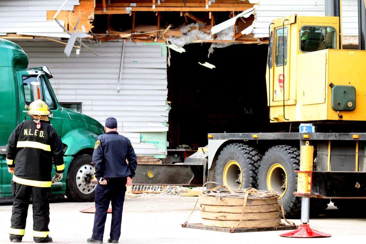 Semitruck crashes into New Lisbon Travel Mart