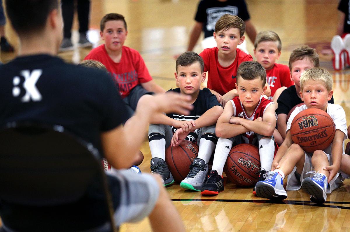La Crosse Aquinas Grad Bronson Koenig Hosts Basketball Camp In