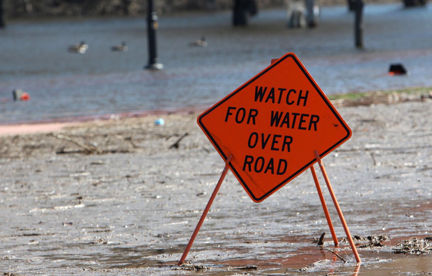 Chippewa River spills out of its banks forces street closures in