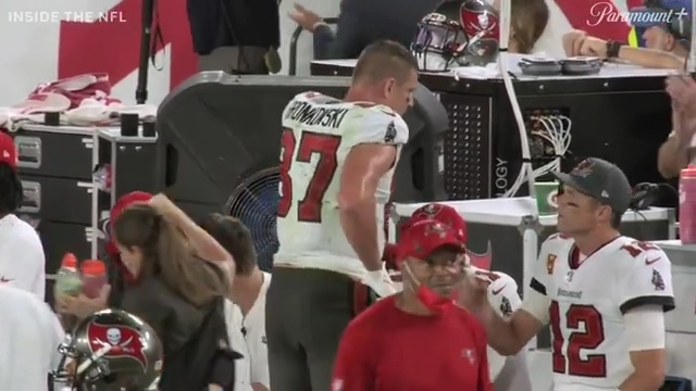 Tom Brady takes batting practice with Rob Gronkowski