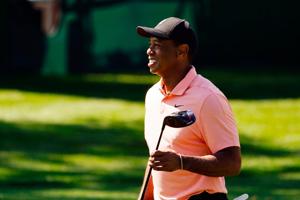 On the prowl? Tiger Woods arrives at Masters, unsure of playing