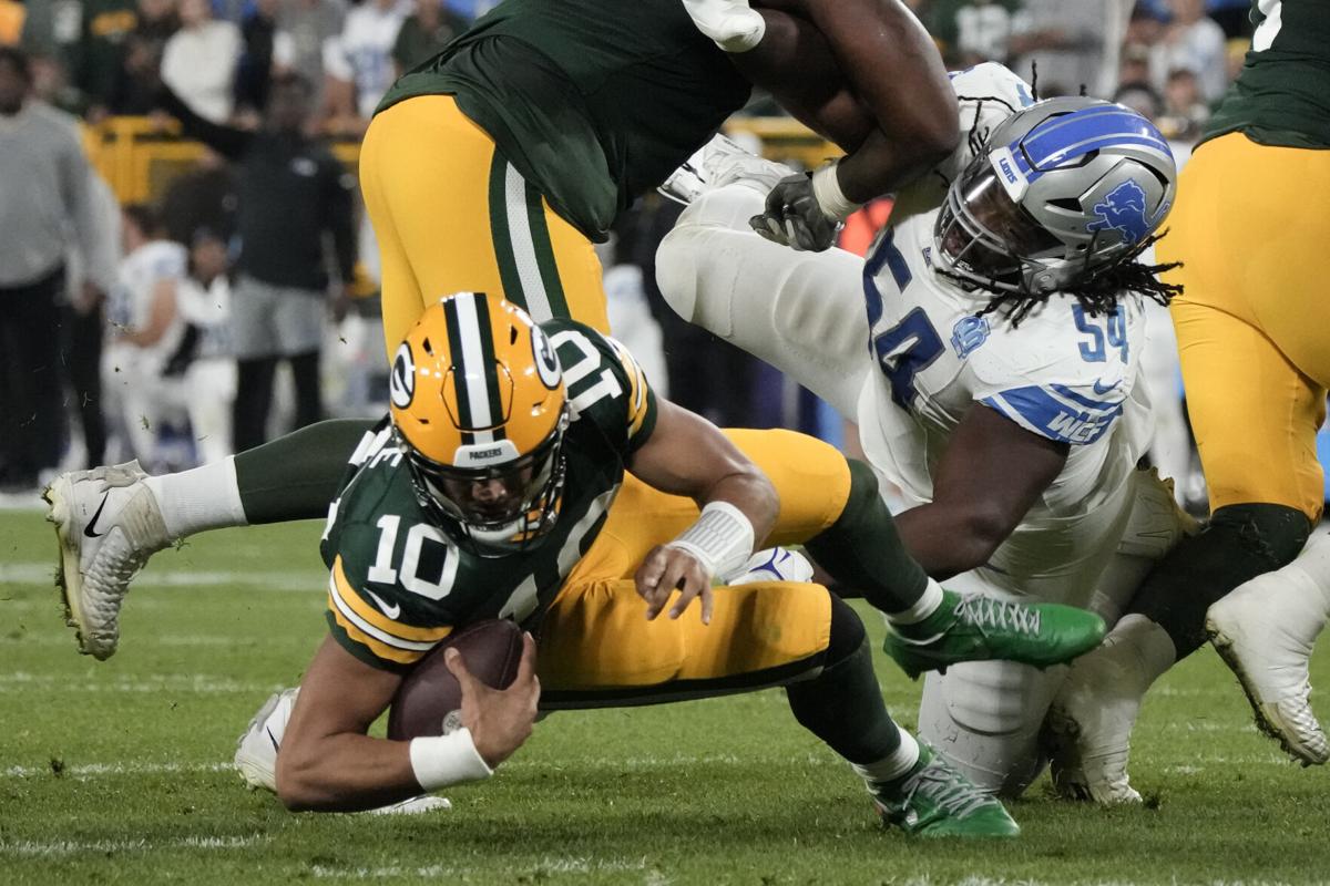 GREEN BAY, WI - JANUARY 08: Green Bay Packers linebacker Quay Walker (7)  celebrates during a game between the Green Bay Packers and the Detroit Lions  at Lambeau Field on January 8