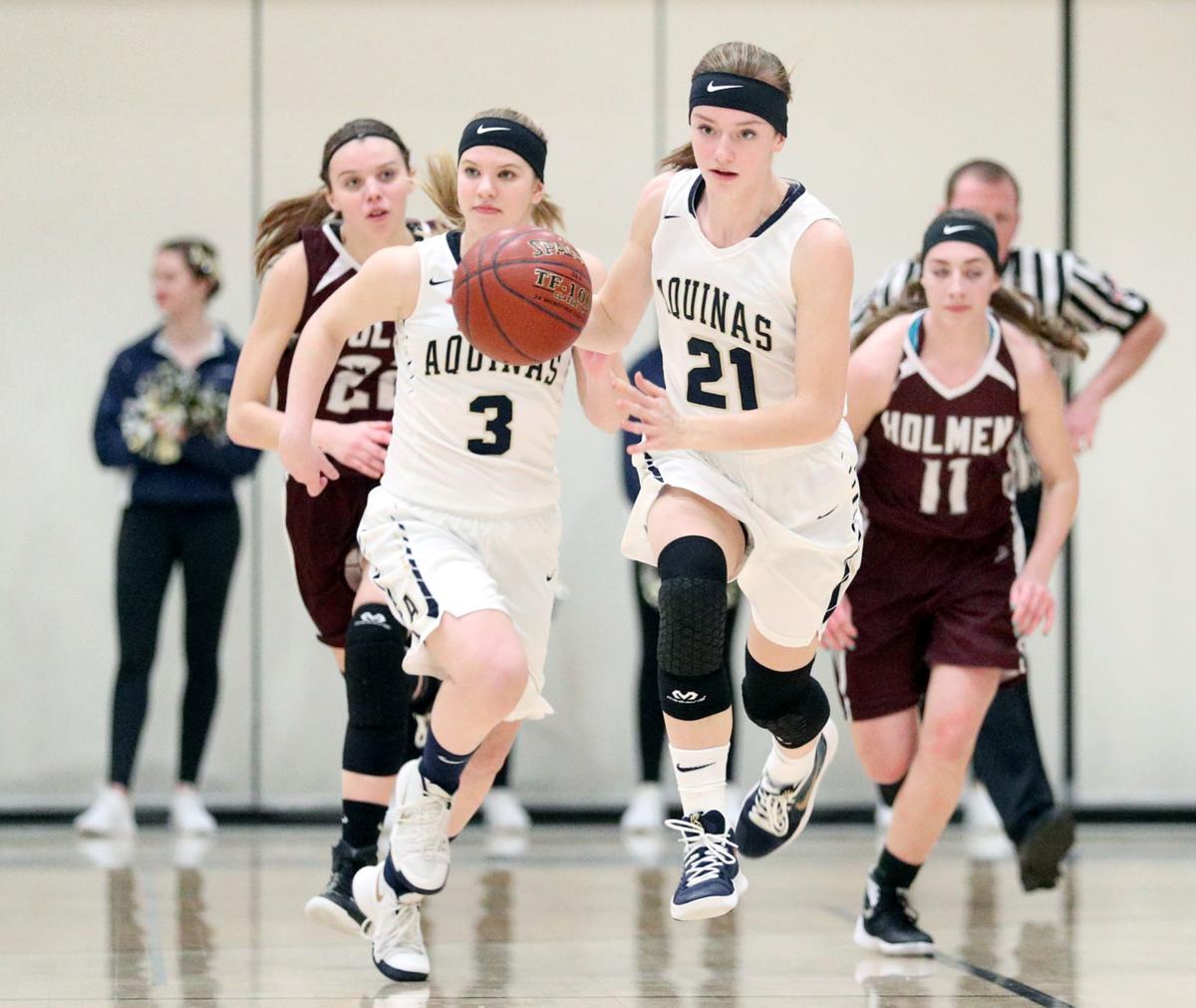 High school girls basketball Topranked La Crosse Aquinas takes care