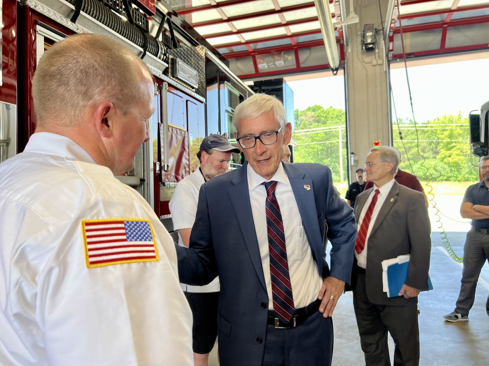 Evers visits Chippewa Falls fire station praises shared revenue bill