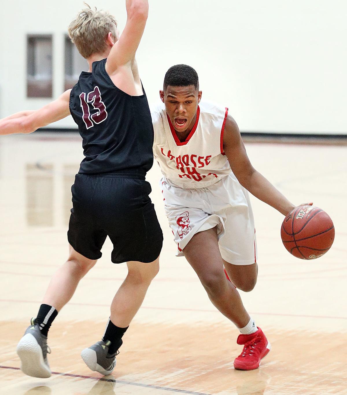 High school basketball Menomonie spoils opener for La Crosse Logan