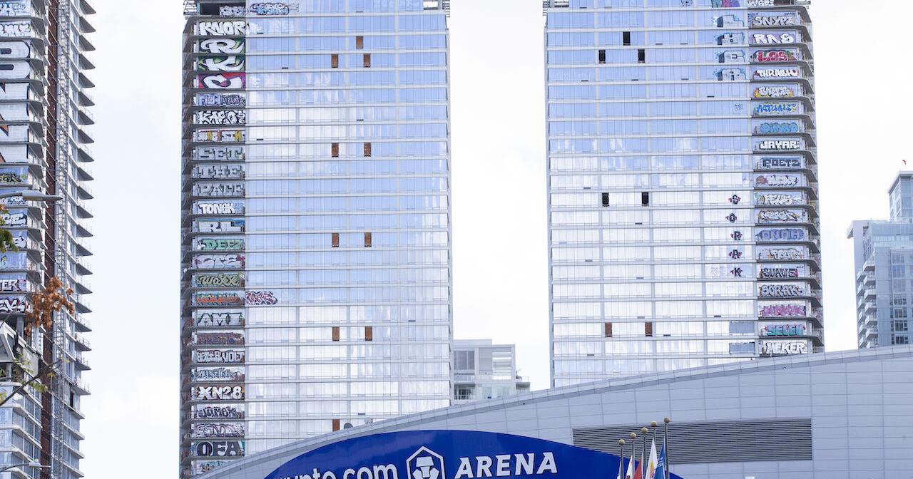 Rebirth Amidst Graffiti: Infamous tagged Oceanwide Plaza goes up for sale - Vimarsana News