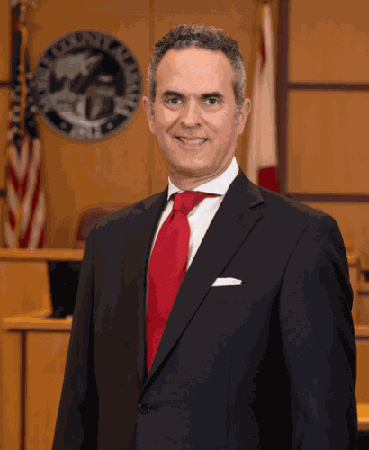 District court candidates pushing through runoff Local