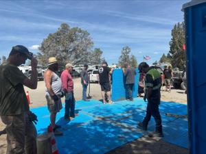 BLM, Pacific Northwest Four Wheel Drive Association install wheelchair-accessible mat at Christmas Valley Sand Dunes and Lost Forest