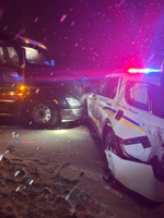 Police Car Slammed By Semi-Truck On Snow-Covered Bridge In Osage Beach