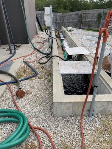 sewer - hoses strewn around.jpg