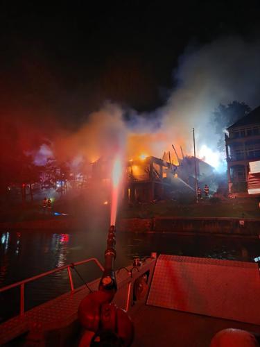 Attacking House Fire By Boat