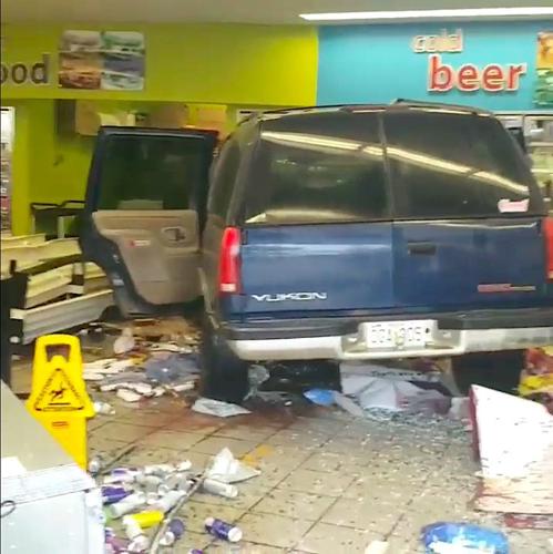 SUV Crashes Through Hy-Vee Gas Station