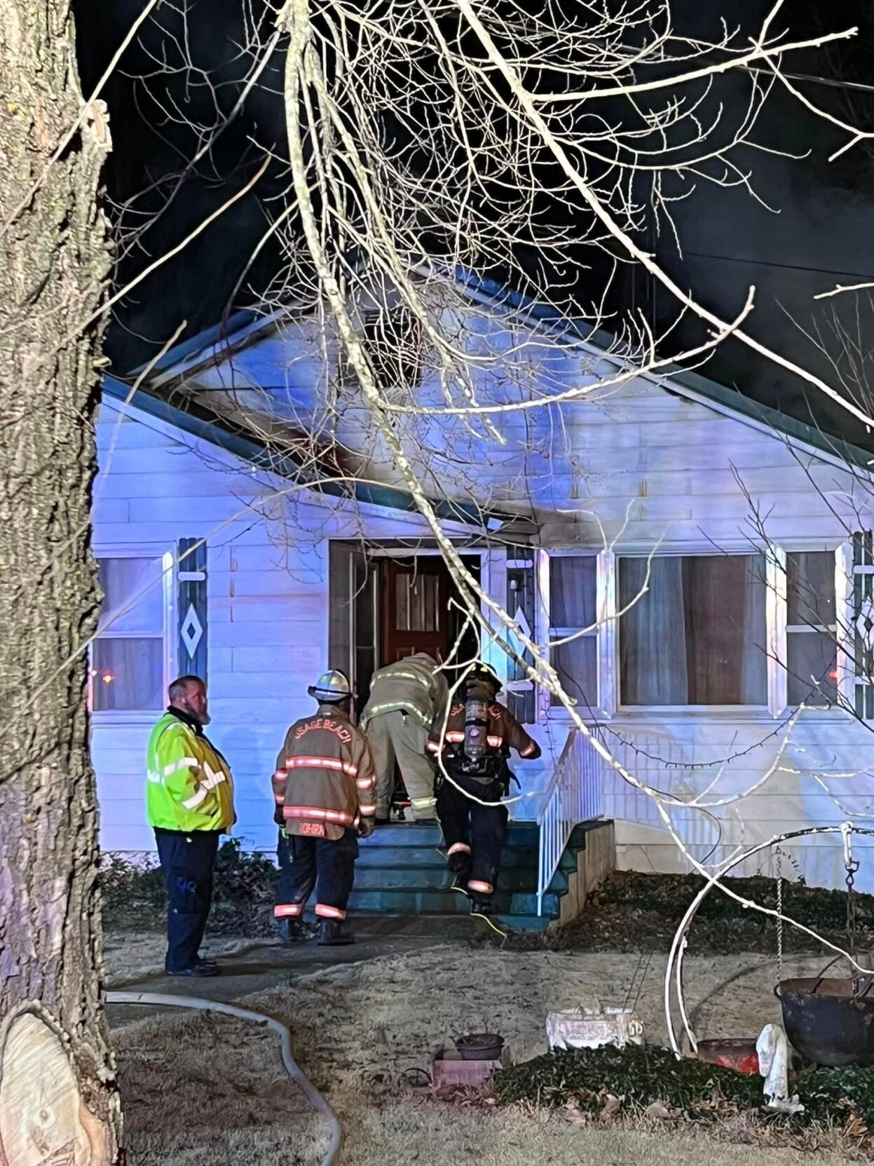 Firefighters Enter Burning Home In Brumley