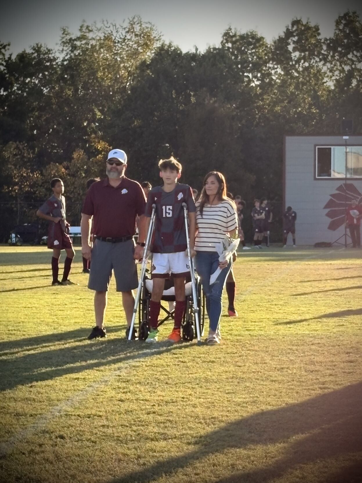 Chase Langelier w parents.jpg