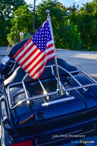 Motorcycle with flag on the back - Bikefest 2024