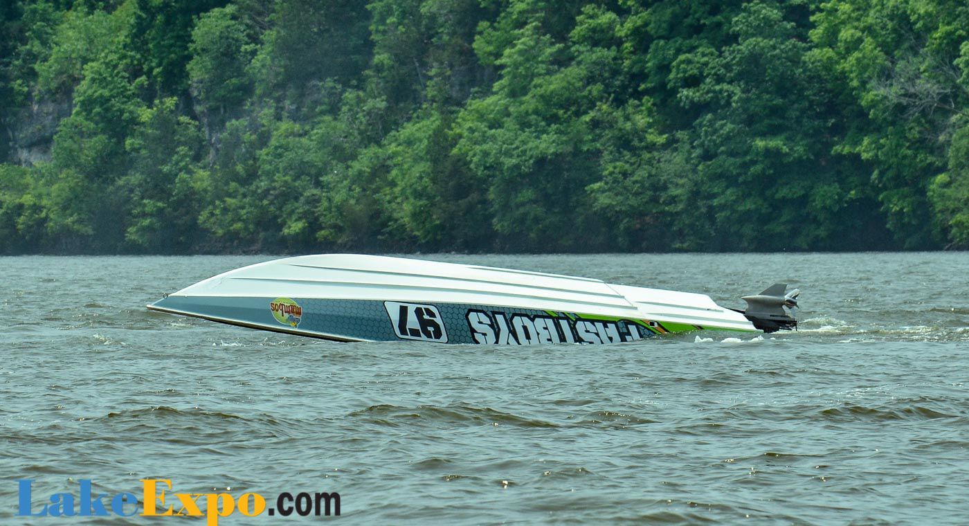 racing boat flipped