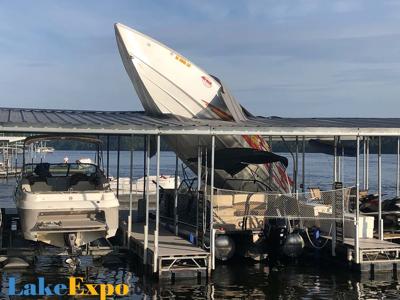 Boat Crashes Through Dock Roof - July 4, 2019