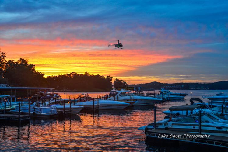 Boats At Sunset Over Lake Of The Ozarks