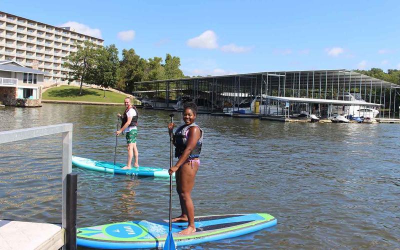 Vivian & Dan Paddleboarding At Lake Of The Ozarks