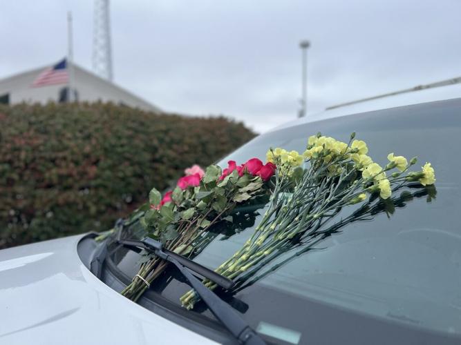 flowers on patrol car.jpeg