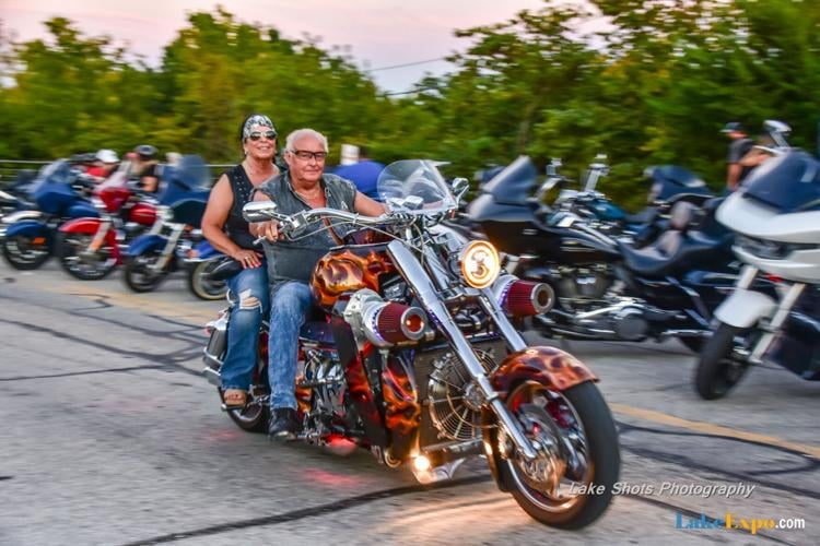 Man and Woman smiling, on an awesome motorcyle at Bikefest 2024